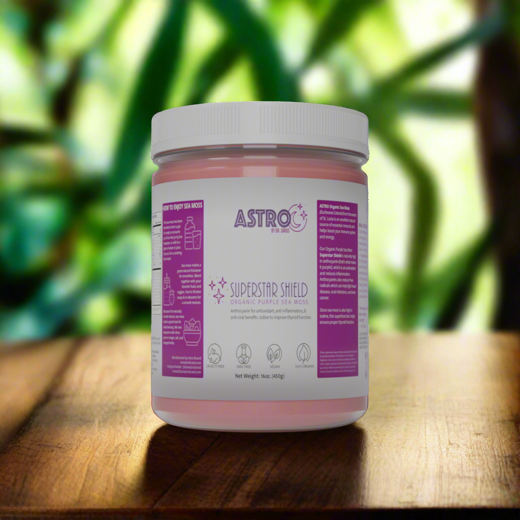 Astro Brand Star Shield Purple Sea Moss Gel 16oz jar on a wooden surface with a nature background.