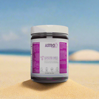 Astro Brand Star Shield Purple Sea Moss Gel 16oz jar on sandy beach backdrop.
