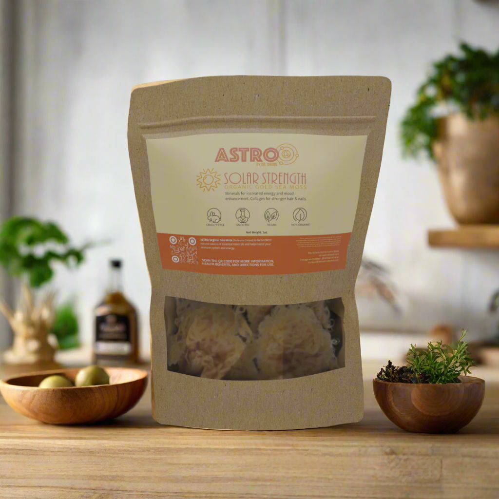Astro Solar Strength Raw Gold Sea Moss package on a wooden table, surrounded by natural ingredients.
